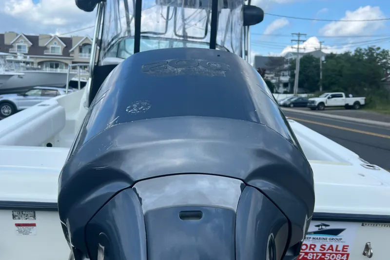 Slide: The Image of 2000 Hydra-Sports 230 Seahorse WA boat with outboard motor, for sale sign visible. - 4