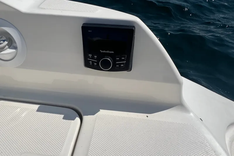 Slide: The Image of 2018 Sea Ray SDX 270 boat with Rockford Fosgate audio system, on calm water. - 4