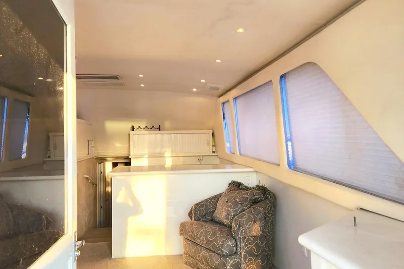 Slide: The Image of Interior of 1988 Ocean Yachts 48 Super Sport with cozy seating and modern design. - 28