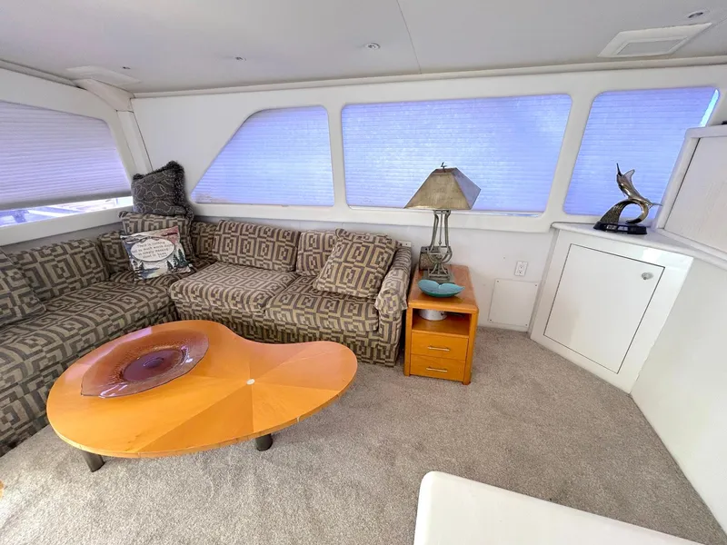 Slide: The Image of Luxurious interior of 1988 Ocean Yachts 48 Super Sport Convertible with plush seating and modern decor. - 32