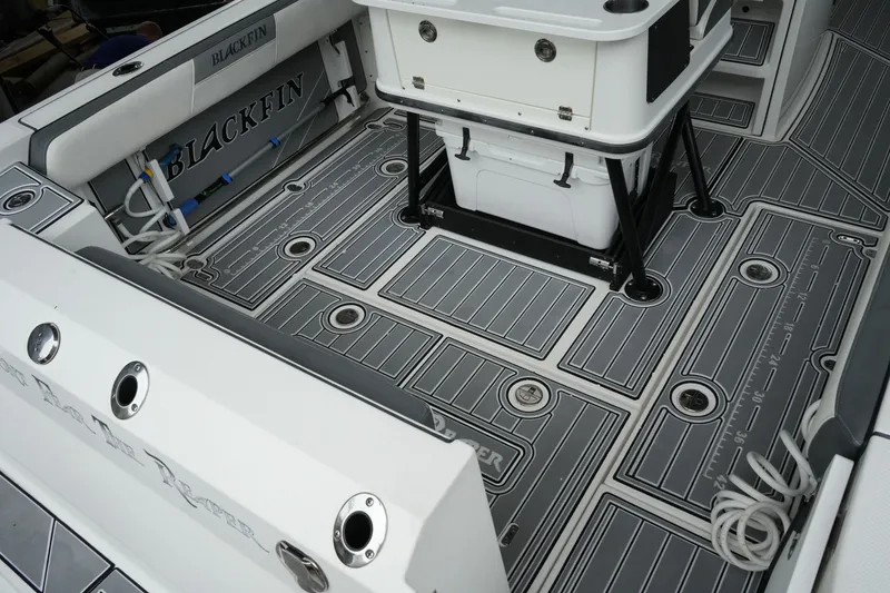 Slide: The Image of 2019 Blackfin 242 CC boat deck with sleek, modern design and integrated storage. - 30