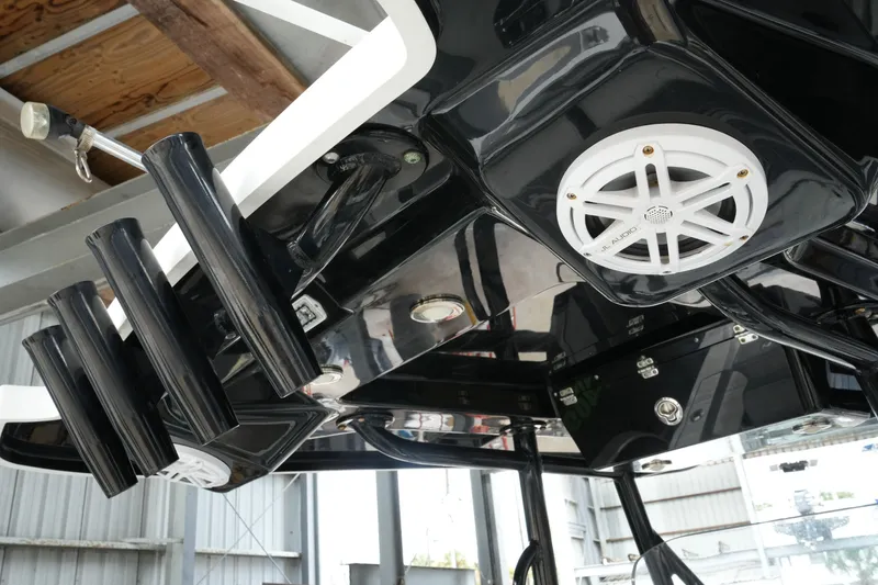 Slide: The Image of 2019 Blackfin 242 CC boat with rod holders and JL Audio speakers. - 35