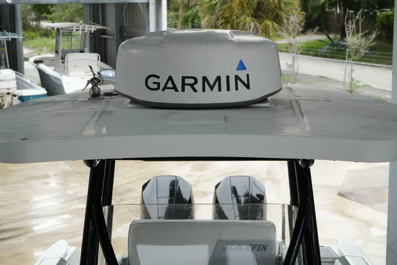 Slide: The Image of 2019 Blackfin 242 CC boat with Garmin radar on top. - 42