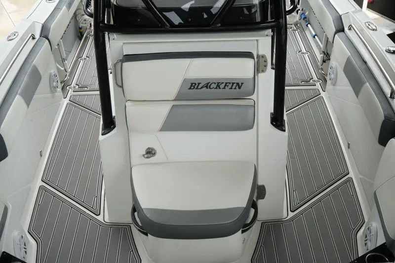 Slide: The Image of 2019 Blackfin 242 CC boat interior with sleek seating and modern design. - 44