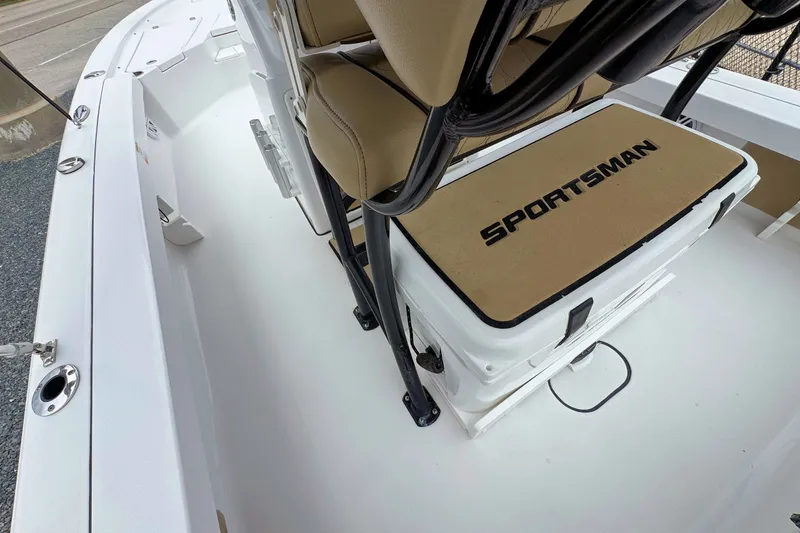 Slide: The Image of 2019 Sportsman Tournament 214 SBX Bay Boat interior with seating and storage. - 13