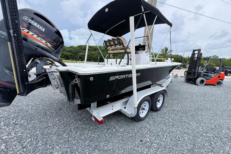 Slide: The Image of 2019 Sportsman Tournament 214 SBX Bay Boat on trailer with Yamaha engine. - 1