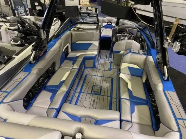Slide: The Image of Interior of a 2023 Centurion Ri245 with blue and gray upholstery. - 3