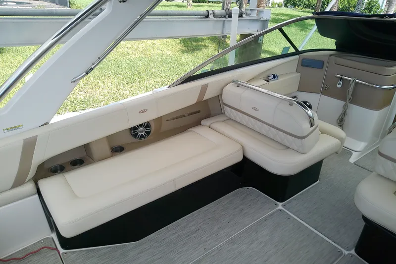 Slide: The Image of 2019 Regal 29 OBX boat interior with beige seating and modern design. - 11