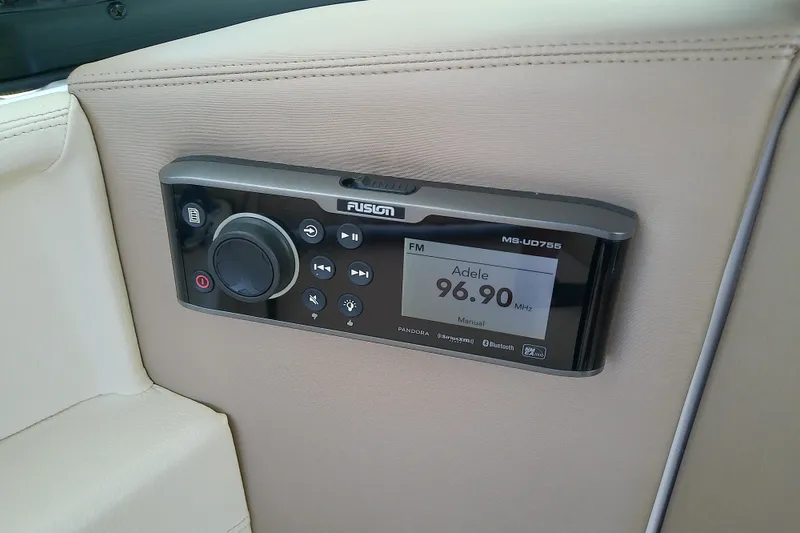 Slide: The Image of Fusion MS-UD755 stereo system on 2019 Regal 29 OBX boat, displaying FM 96.90 MHz. - 24