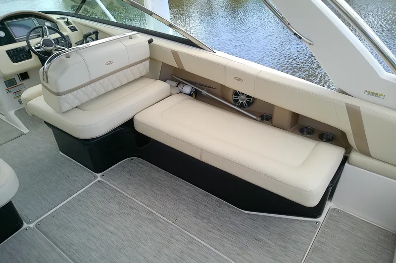 Slide: The Image of Luxurious interior of 2019 Regal 29 OBX boat with beige seating and modern design. - 12