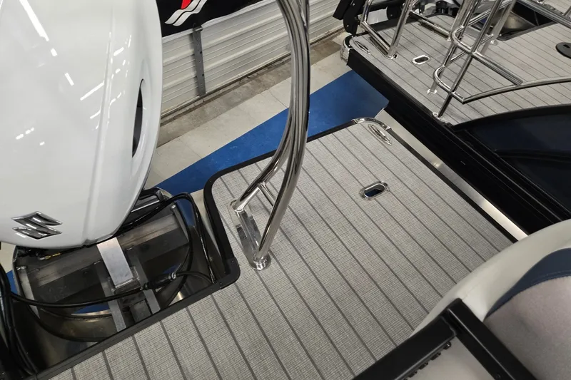 Slide: The Image of 2027 Godfrey Sweetwater 2286 SBC boat deck with Suzuki engine and stainless steel railing. - 21