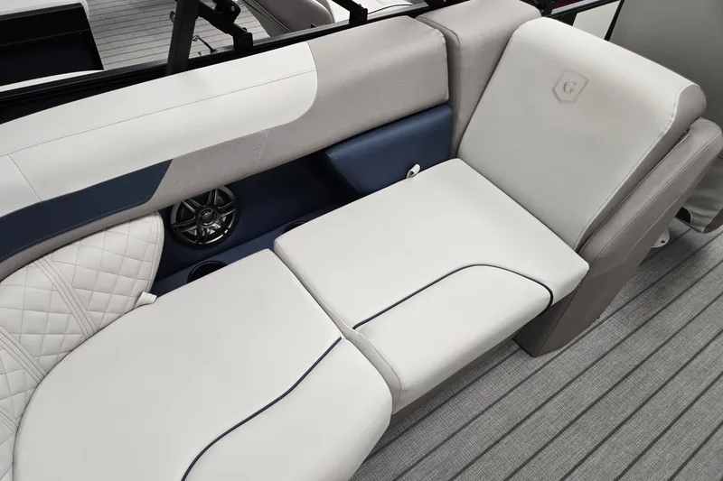Slide: The Image of Luxurious seating on 2027 Godfrey Sweetwater 2286 SBC boat, featuring elegant upholstery and speaker system. - 23