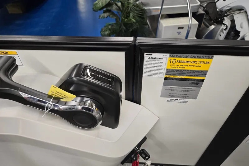 Slide: The Image of Control panel and capacity label on 2027 Godfrey Sweetwater 2286 SBC boat. - 14