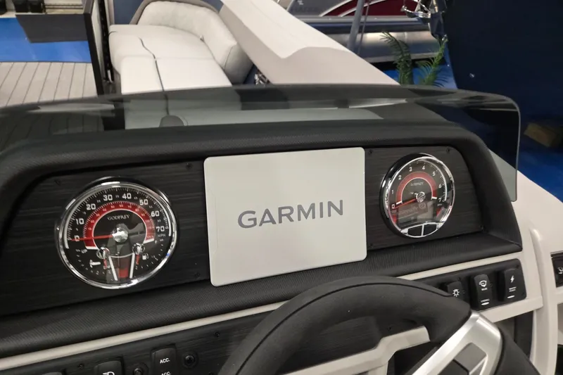 Slide: The Image of Dashboard of 2027 Godfrey Sweetwater 2286 SBC with Garmin display and gauges. - 11