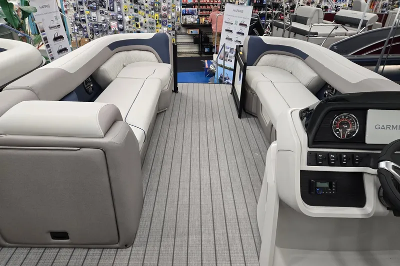 Slide: The Image of Interior of 2027 Godfrey Sweetwater 2286 SBC pontoon boat with plush seating and modern dashboard. - 25