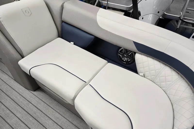 Slide: The Image of Luxurious seating on 2027 Godfrey Sweetwater 2286 SBC boat, featuring elegant upholstery and speaker system. - 24