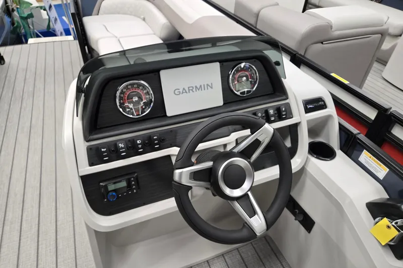 Slide: The Image of Steering console of 2027 Godfrey Sweetwater 2286 SFLC boat with Garmin display. - 9