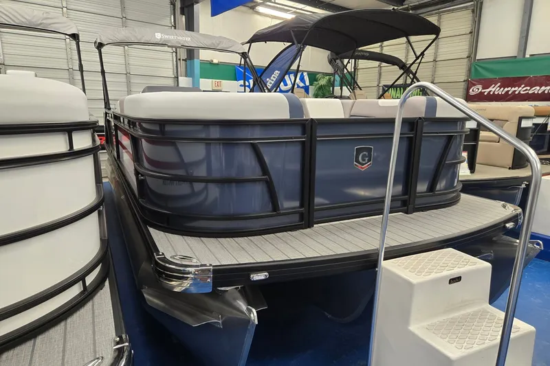 Slide: The Image of 2027 Godfrey Sweetwater 2286 SFLC pontoon boat in showroom, rear view. - 1