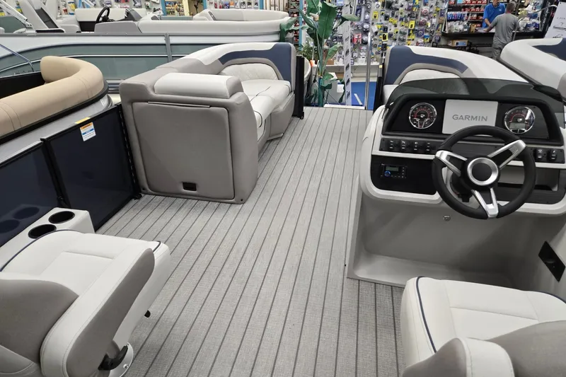 Slide: The Image of Interior of 2027 Godfrey Sweetwater 2286 SFLC boat with modern seating and Garmin dashboard. - 20