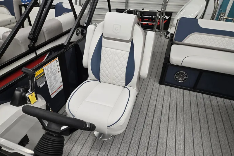 Slide: The Image of Captain's chair on 2027 Godfrey Sweetwater 2286 SFLC pontoon boat, featuring sleek design and comfortable seating. - 8