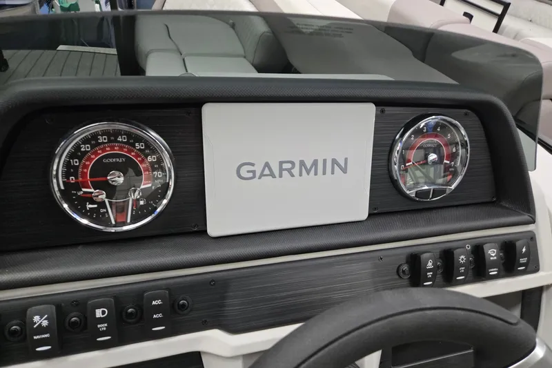 Slide: The Image of Dashboard of 2027 Godfrey Sweetwater 2286 SFLC with Garmin display and gauges. - 10