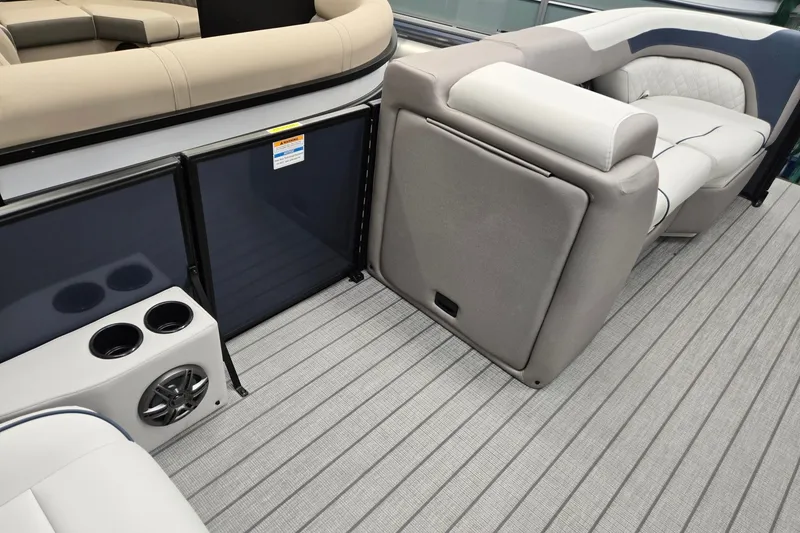 Slide: The Image of Interior of 2027 Godfrey Sweetwater 2286 SFLC pontoon boat with seating and cup holders. - 23