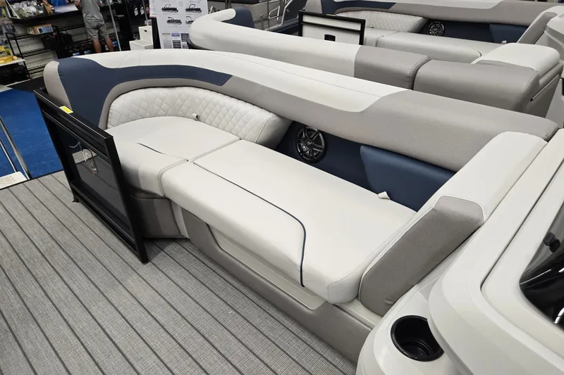 Slide: The Image of 2027 Godfrey Sweetwater 2286 SFLC boat interior with luxurious seating and modern design. - 25
