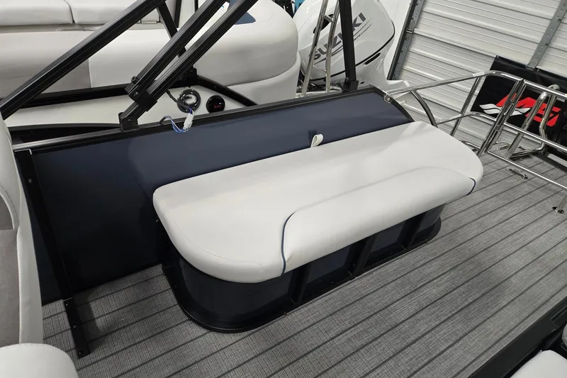 Slide: The Image of 2027 Godfrey Sweetwater 2286 SFLC boat interior with cushioned seating and sleek design. - 15