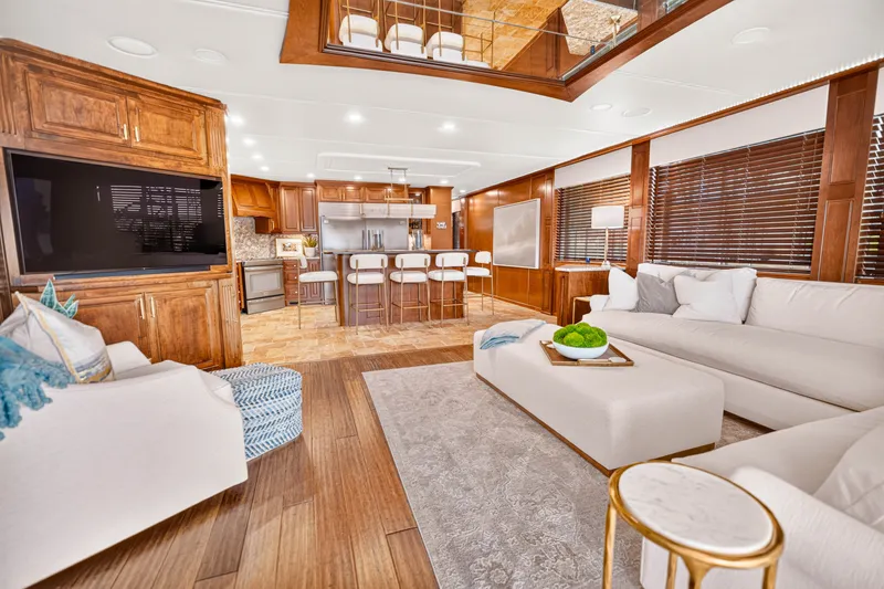Slide: The Image of Luxurious Stardust Cruisers 2010 houseboat interior with modern kitchen, cozy seating, and elegant decor. - 15