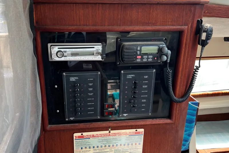 Slide: The Image of The image shows the control panel of a 1993 Gemini Catamaran 3400 with navigation equipment. - 16