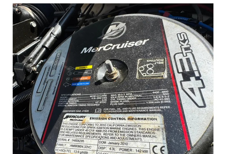 Slide: The Image of MerCruiser 4.3 TKS engine cover on a 2010 Sea Ray 185 Sport boat. - 16
