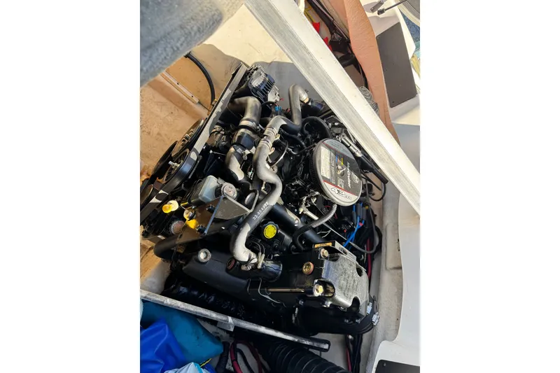 Slide: The Image of Engine of a 2010 Sea Ray 185 Sport boat, detailed view. - 13