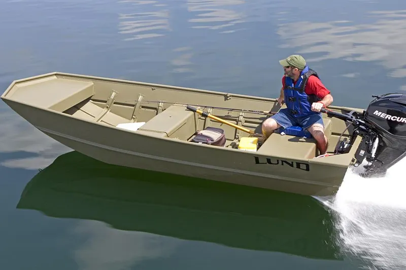 Slide: The Image of Manufacturer Provided Image: 2022 Lund 1240 boat in motion on calm water. - 5