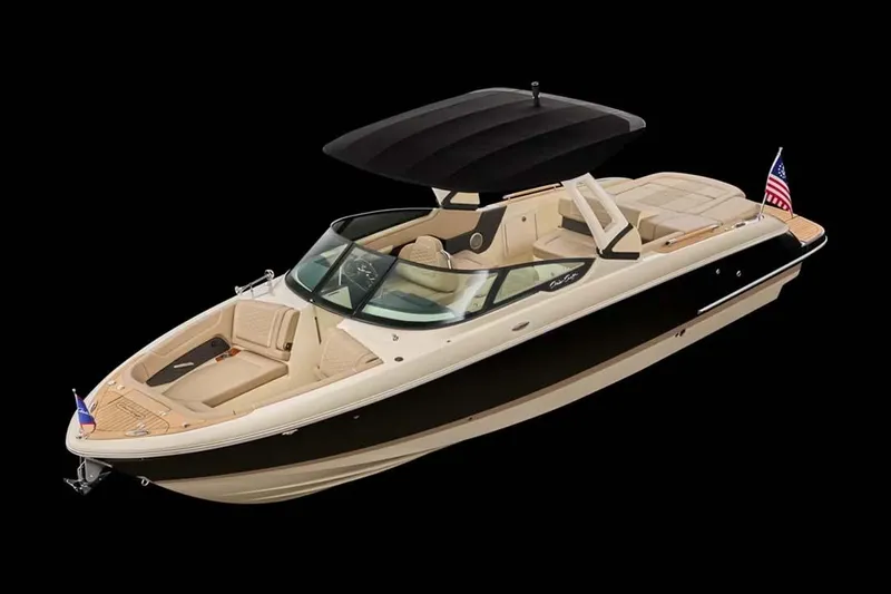 Slide: The Image of Manufacturer Provided Image: Manufacturer Provided Image: 2025 Chris-Craft Sportster 28 boat with sleek design and American flags, on black background. - 1