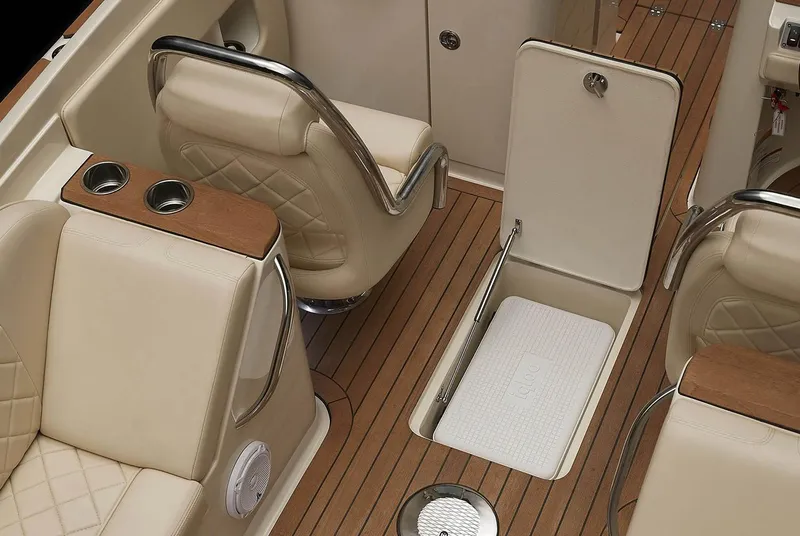 Slide: The Image of Manufacturer Provided Image: 2025 Chris-Craft Launch 27 interior with beige seating and wood flooring. - 8