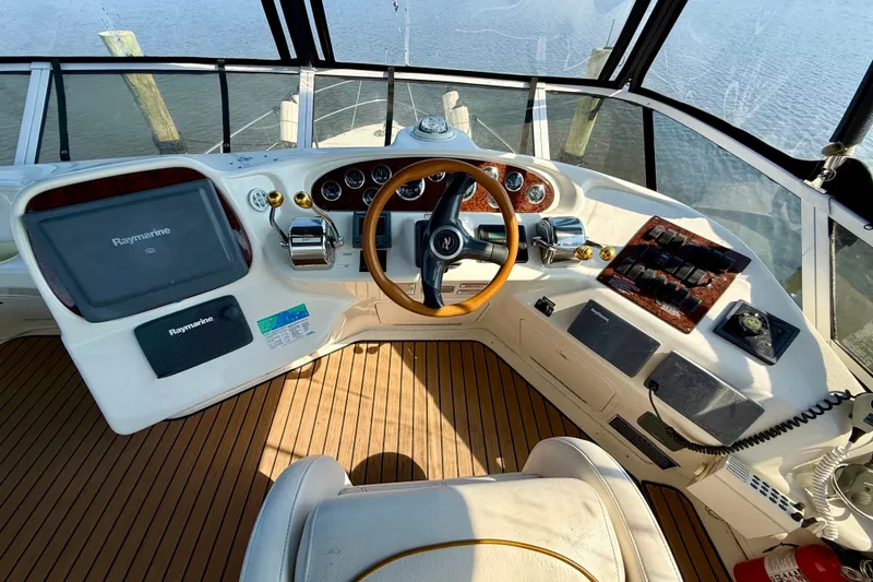 Slide: The Image of Cockpit of 2000 Sea Ray 380 Aft Cabin yacht with Raymarine navigation system. - 20