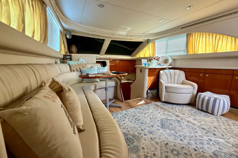 Slide: The Image of Luxurious interior of a 2000 Sea Ray 380 Aft Cabin yacht with elegant furnishings. - 14