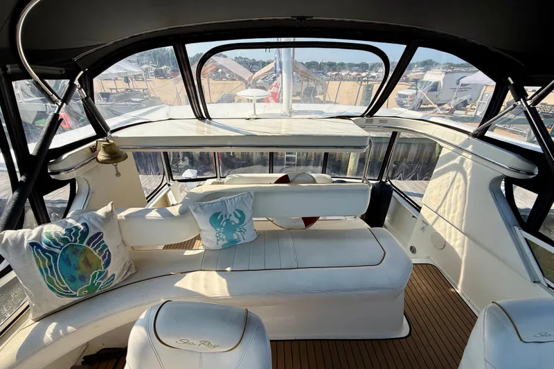 Slide: The Image of Interior of 2000 Sea Ray 380 Aft Cabin yacht with plush seating and nautical decor. - 6