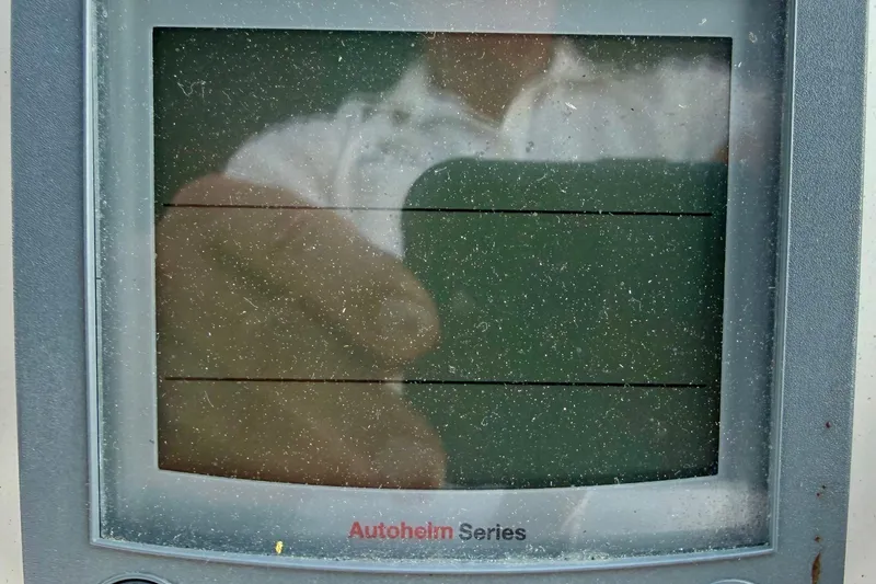 Slide: The Image of Autohelm Series display on 2000 Sea Ray 380 Aft Cabin boat, showing reflection. - 23