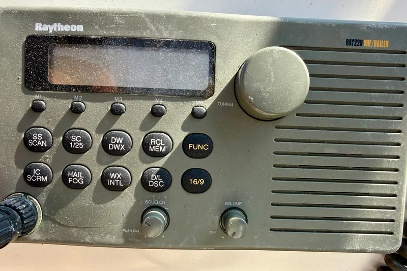 Slide: The Image of Raytheon RAY220 VHF marine radio on a 2000 Sea Ray 380 Aft Cabin yacht. - 24