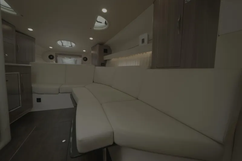 Slide: The Image of Luxurious interior of 2021 Regal 33 XO yacht with plush seating and modern design. - 23