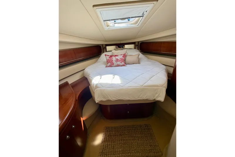 Slide: The Image of Luxurious cabin interior of 2006 Sea Ray 52 Sundancer yacht with cozy bedding. - 32