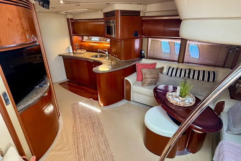 Slide: The Image of Luxurious interior of 2006 Sea Ray 52 Sundancer yacht with elegant wood finishes. - 44