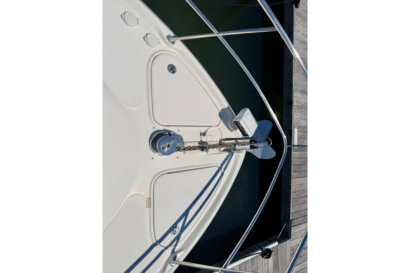 Slide: The Image of Bow view of 2006 Sea Ray 52 Sundancer yacht with anchor and railing details. - 29