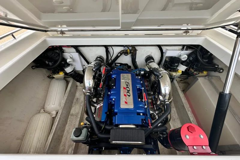 Slide: The Image of Engine compartment of a 2001 Fountain 29 Fever boat, featuring a Mercury 500 EFI engine. - 19