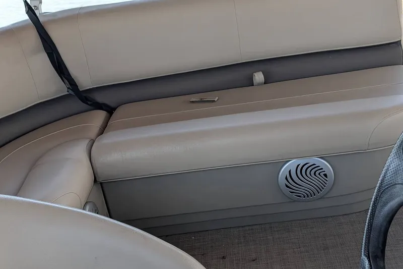 Slide: The Image of Interior seating of 2021 Sun Tracker Bass Buggy 16 XL with speaker detail. - 23