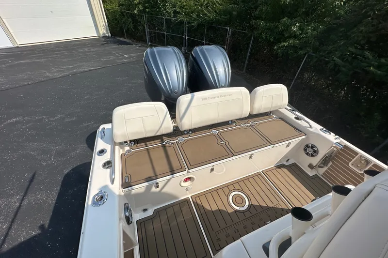 Slide: The Image of 2023 Grady-White 281 Coastal Explorer boat with dual engines and spacious deck layout. - 40