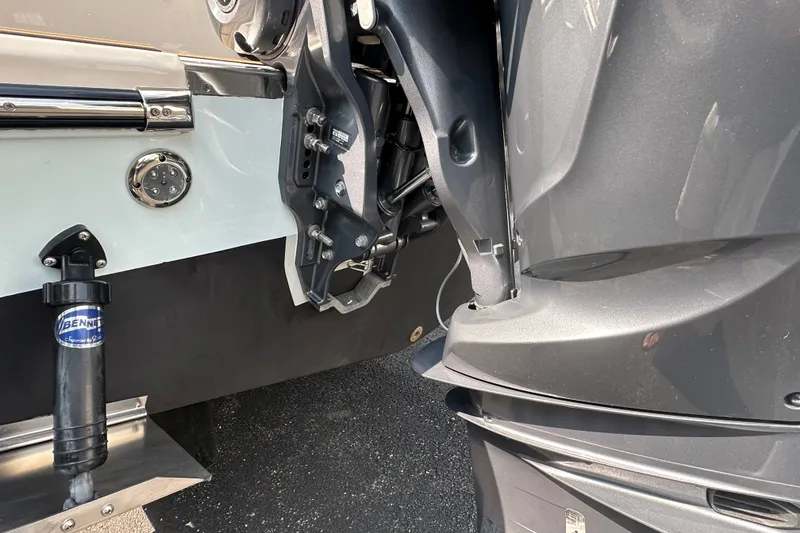 Slide: The Image of Close-up of 2023 Grady-White 281 Coastal Explorer boat engine and trim tab. - 42
