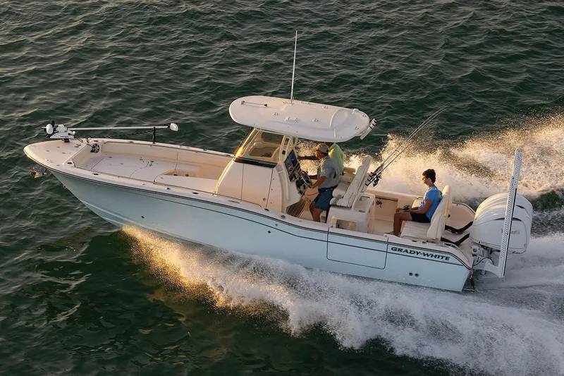Slide: The Image of Manufacturer Provided Image: 2023 Grady-White 281 Coastal Explorer boat cruising on water. - 43