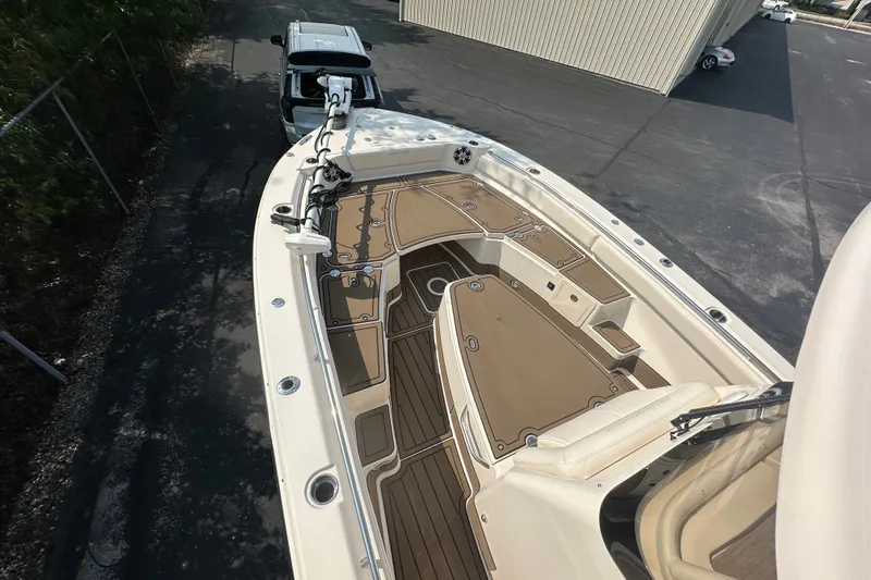 Slide: The Image of 2023 Grady-White 281 Coastal Explorer boat with spacious deck and modern design. - 14
